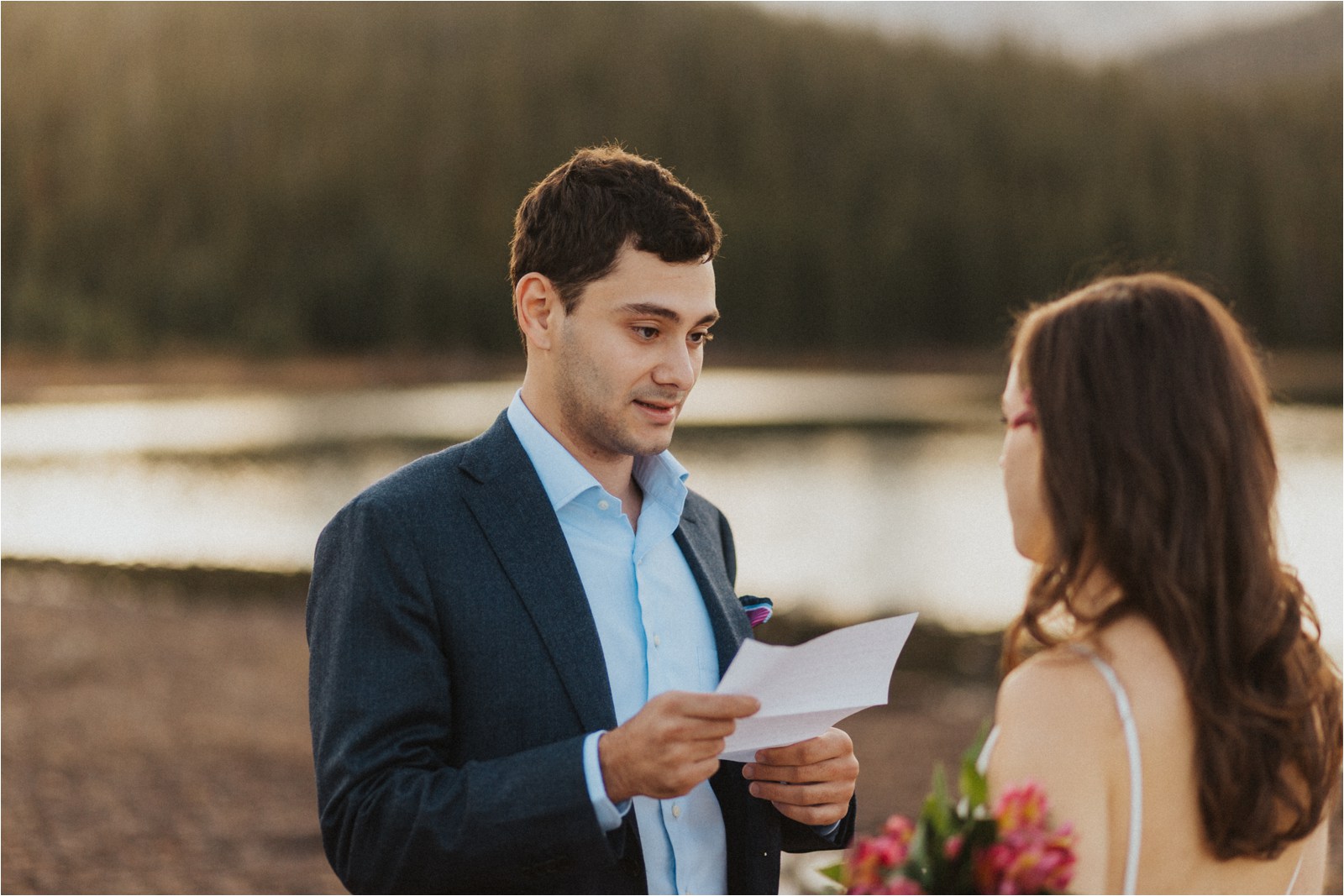 Emotional groom declaring his vows to his bride during their elopement in Colorado.