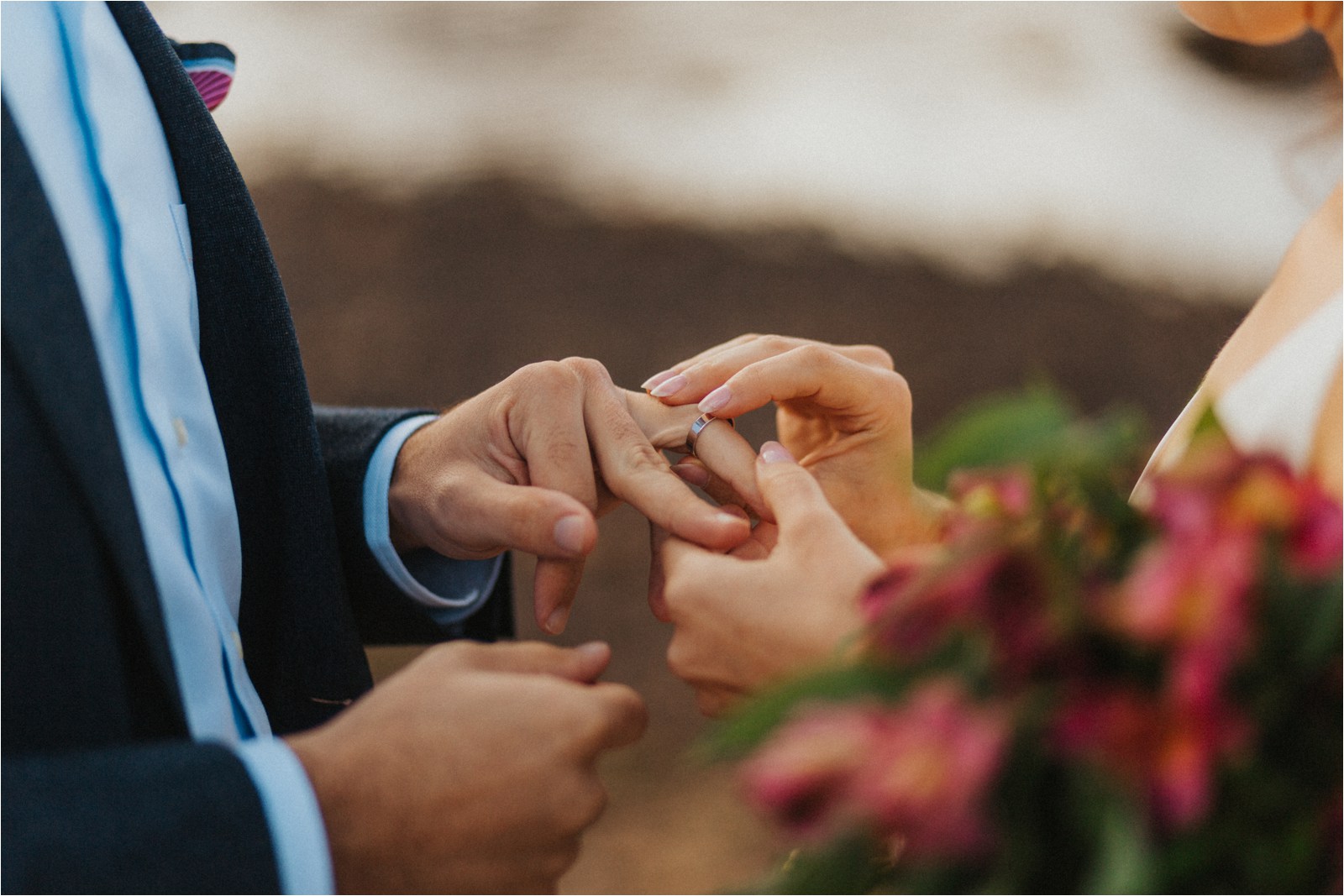 Ring ceremony during an elopement in Colorado.